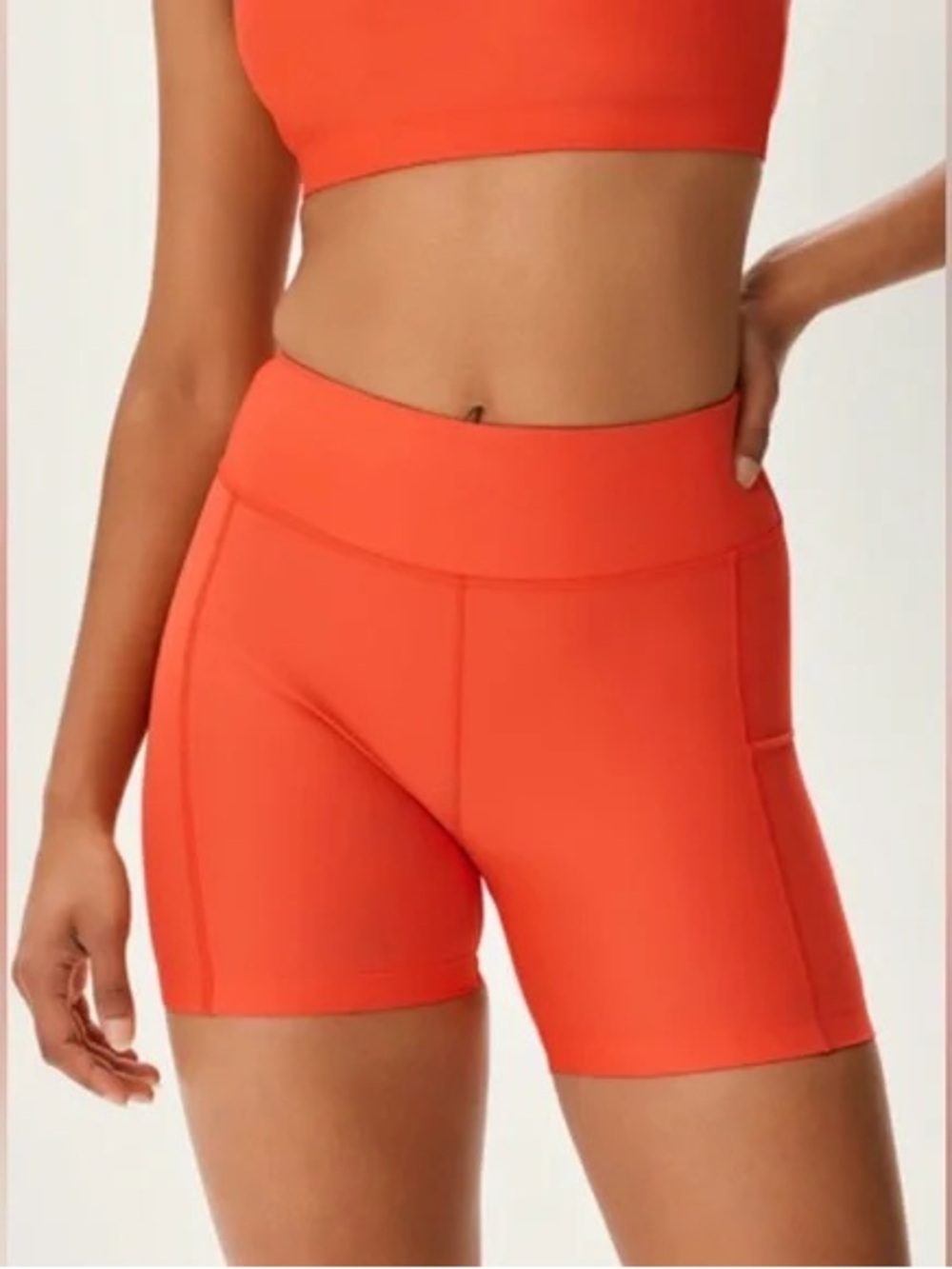Outdoor Voices Women’s High-Waist Orange Active Bike Shorts with Pockets